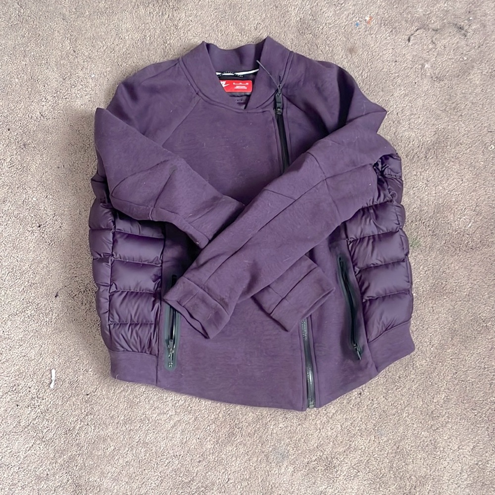 nike asymmetrical puff jacket